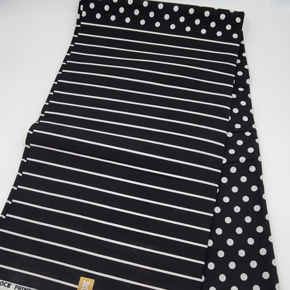 White and black tribal African ankara fabric sold per yard or as you want.